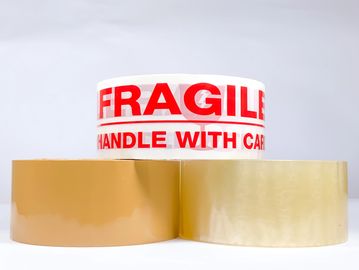 Three rolls of packaging tape, one labeled 'Fragile Handle With Care'.