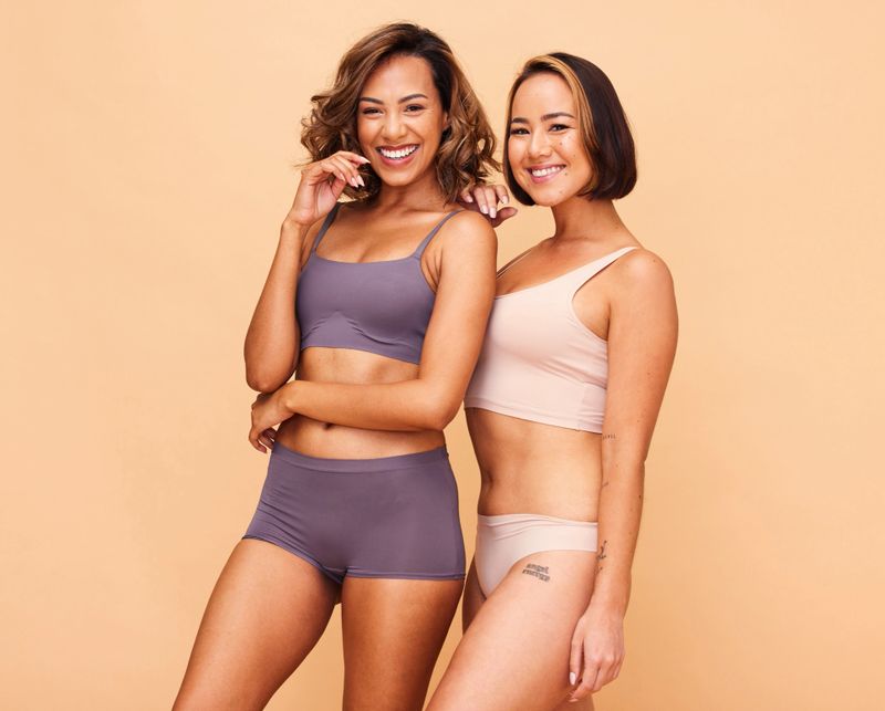 Beauty, self love and friends with portrait of women in studio for health, body and cosmetics. Spa, diversity and skincare with people on beige background for support, pride and solidarity on mockup