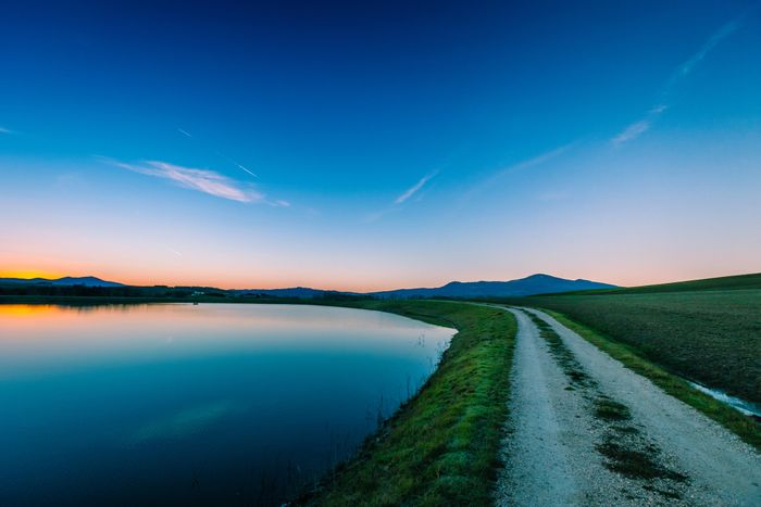 A lush green landscape symbolizing sustainable growth and eco-friendly progress.