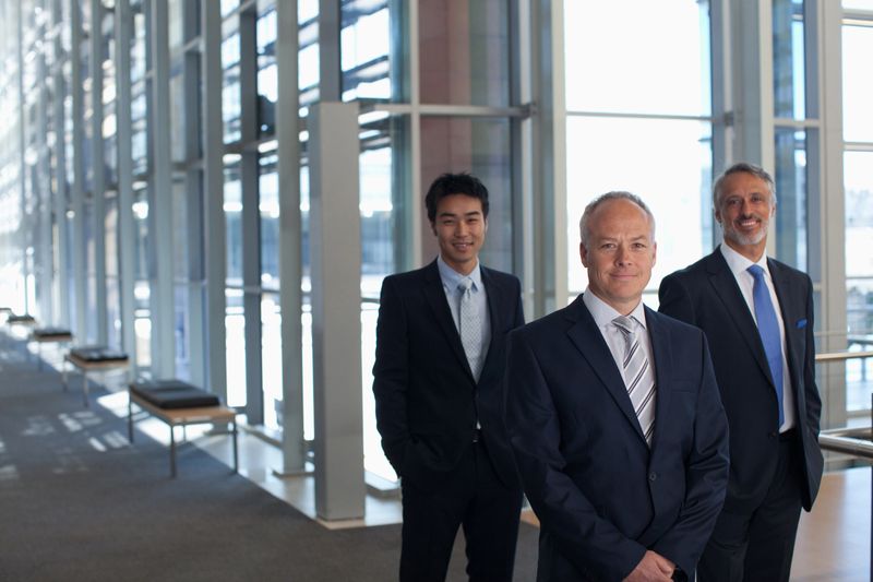 Business people in office lobby