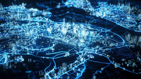 Futuristic digital city map with glowing blue lines and structures.