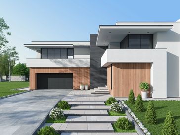 Modern white house with wooden accents and landscaped front yard.