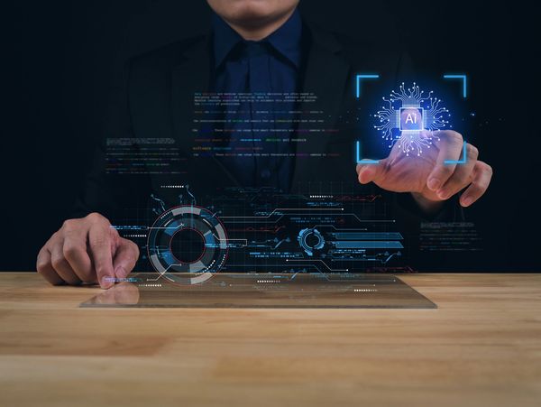 Businessman interacting with futuristic AI digital interface.