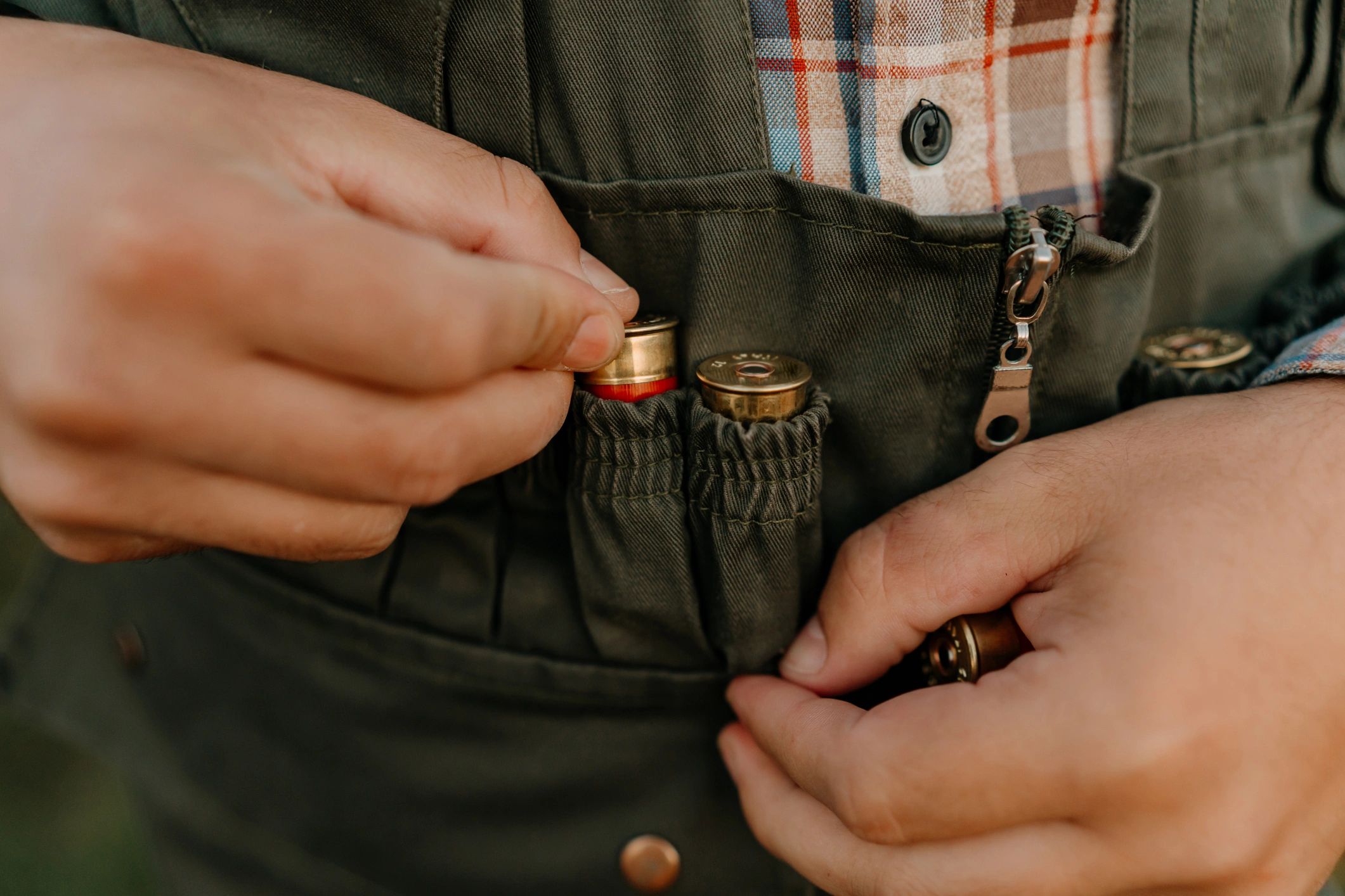 Vintage ad for Blake's Overalls &amp; Guns featuring two boys in overalls holding a pig.