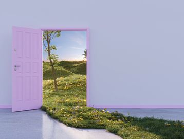 Open purple door reveals a lush garden path flowing into a room.