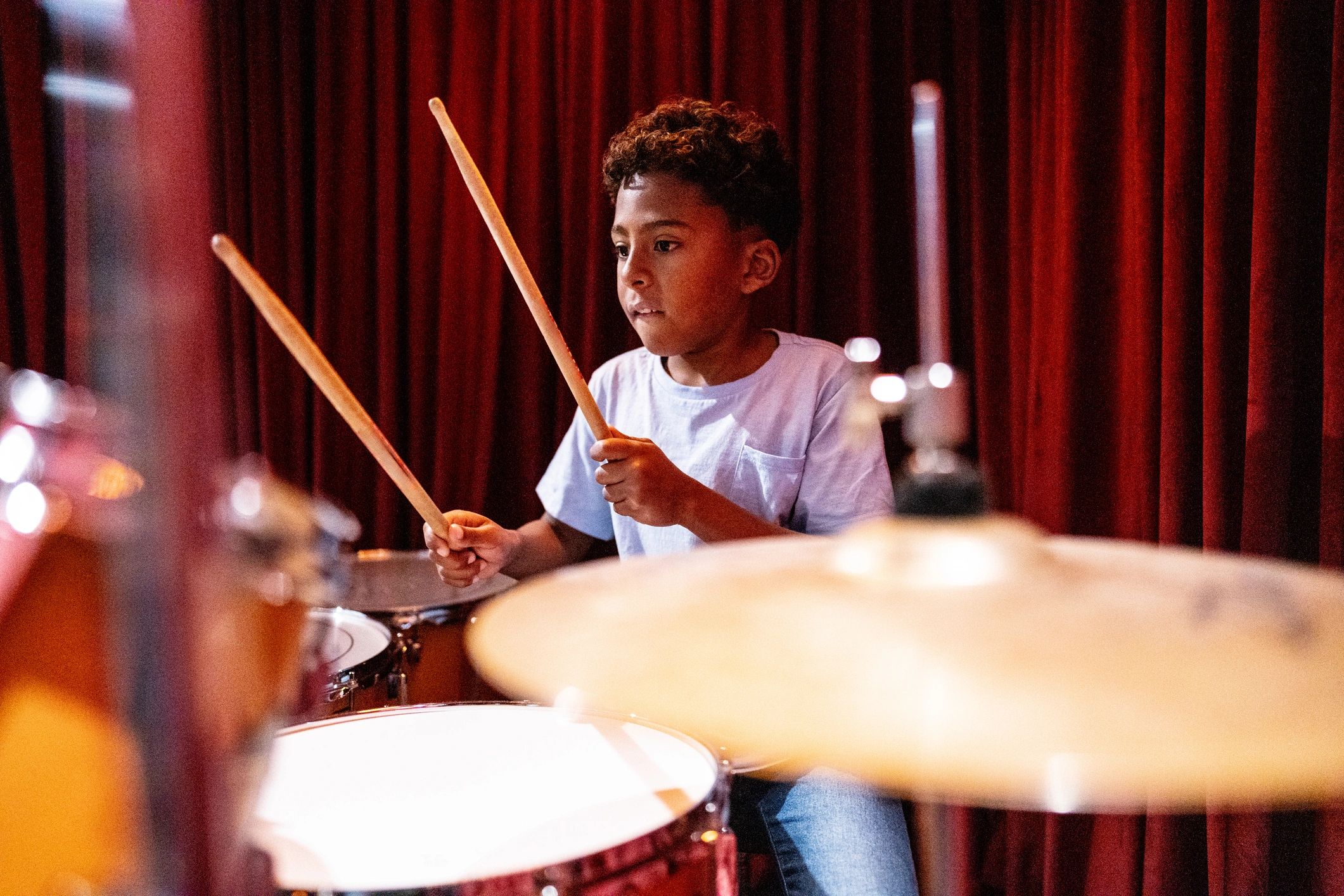 Young Child Playing Drums