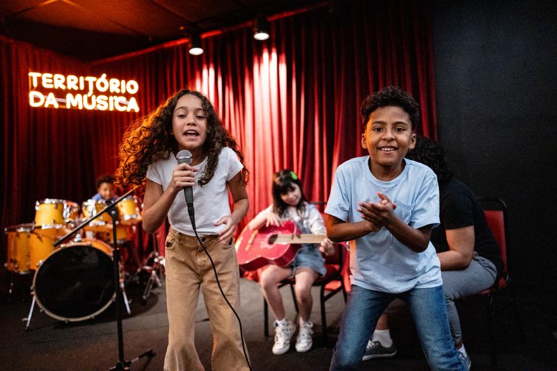 Portrait of children singing in a music school