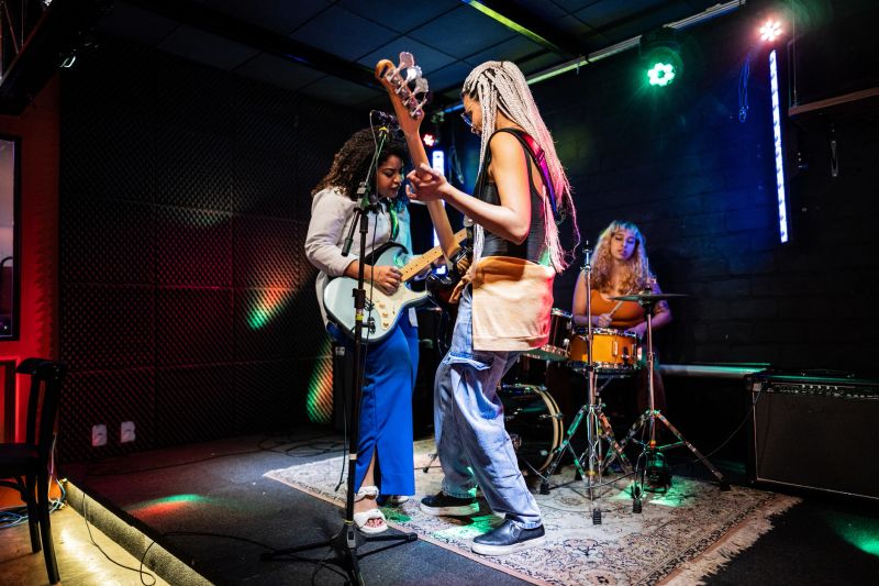 Musicians playing and singing on a show