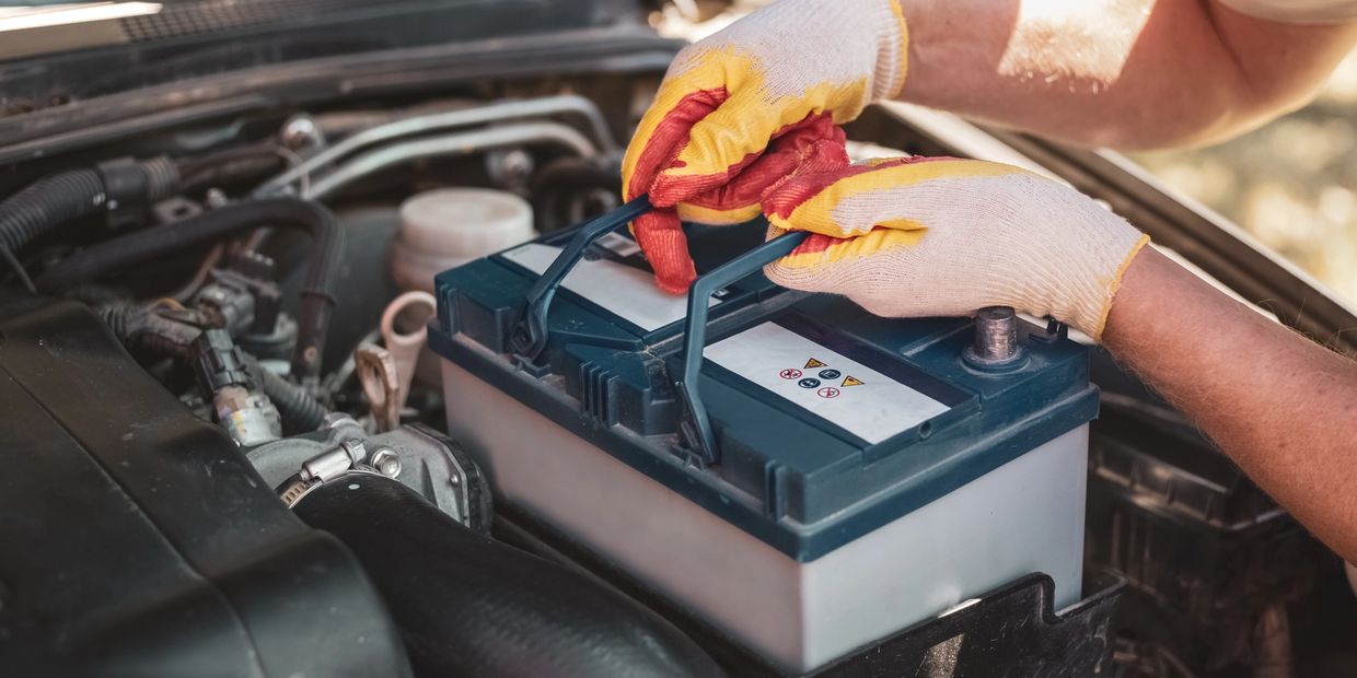 a battery is being replaced at st george auto gallery service 
