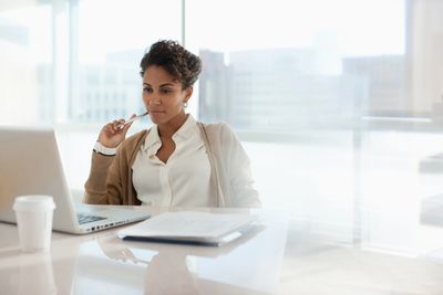 a woman working in her laptop