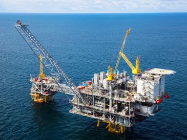 Offshore oil rig in the middle of the ocean.