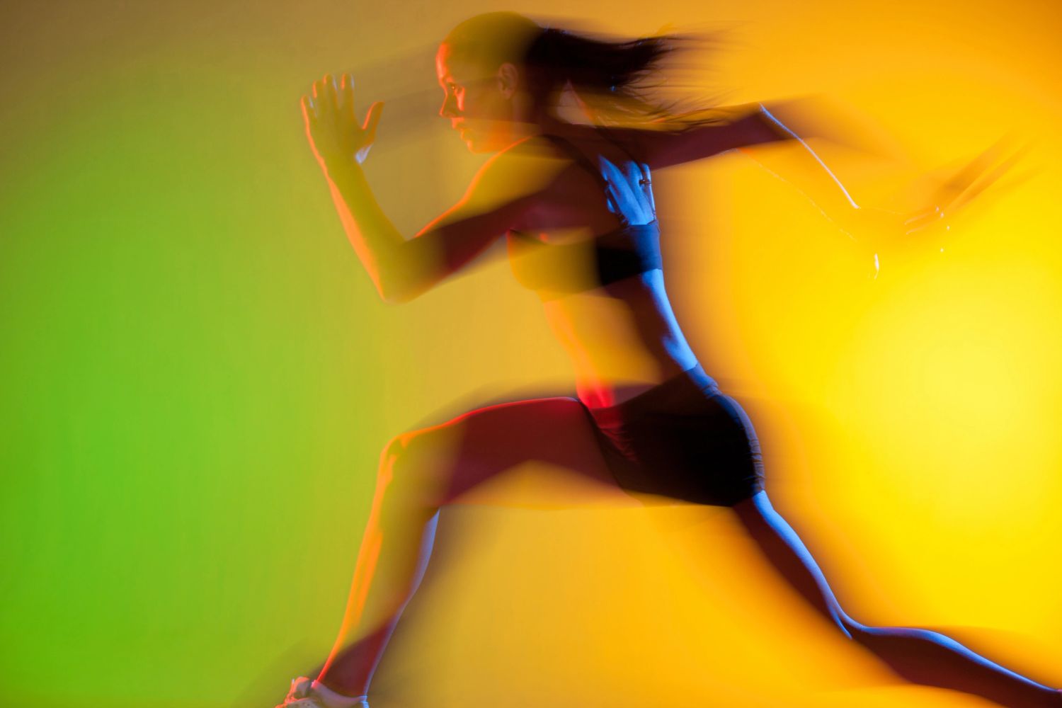 Athlete running in a blurry image