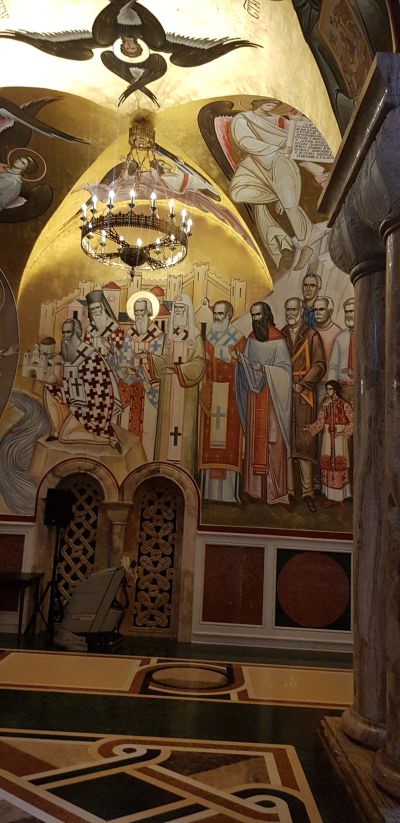 Sunlight filters through church windows, illuminating the sanctuary.