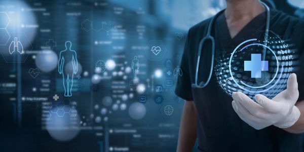 Medical professional holding futuristic healthcare symbol.