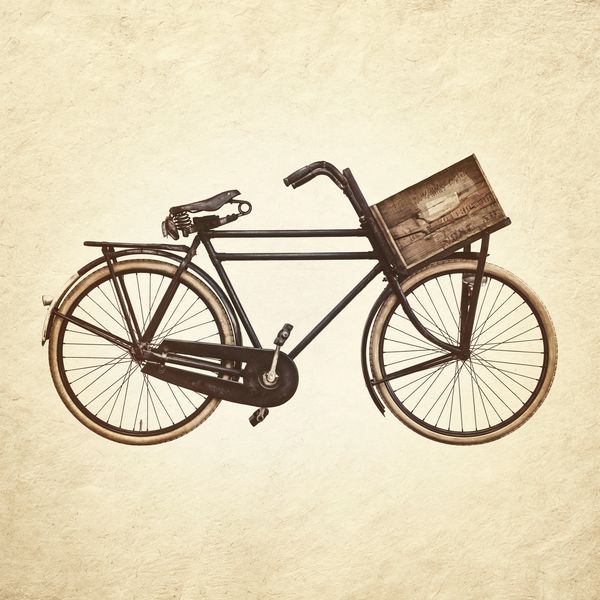 Vintage black bicycle with a wooden crate on the front.