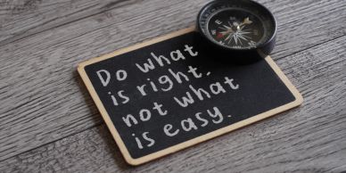 Chalkboard message with compass about doing what's right.
