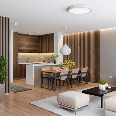 Modern dining area and kitchen with wooden accents and minimalist design.