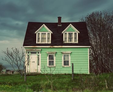 Beautiful home exterior with front yard garden