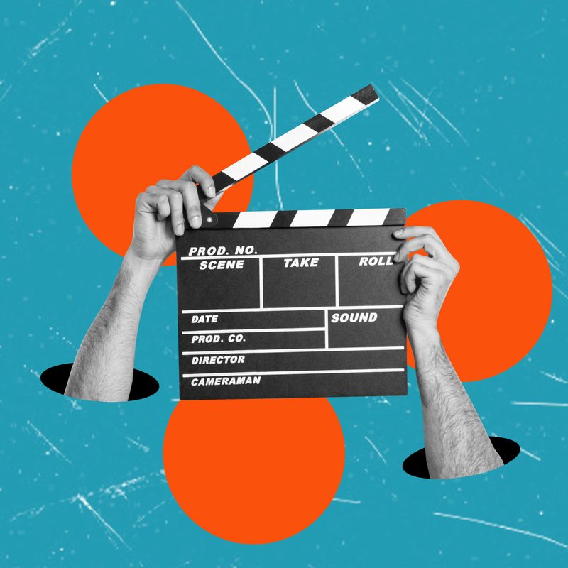 Hands holding a clapper while shooting a video movie in a studio. A clapper for a movie production. Action, day of theater, contemporary art collage.