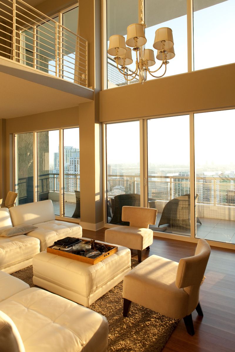Naturally lit interior of a luxurious and modern living room.