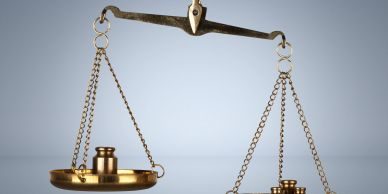 Antique balance scale with weights.