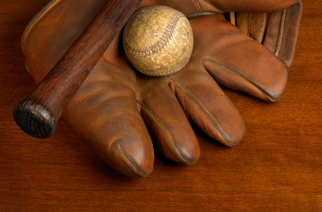 Vintage photo of a smiling man in a cap.