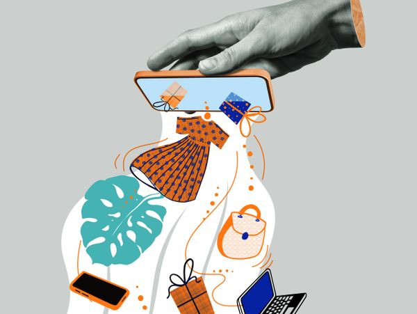 Hand holding a phone with shopping items flowing out, symbolizing online shopping.