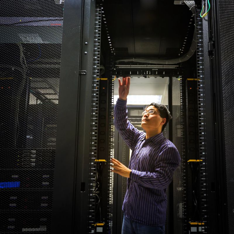 Computer Technician/network administrator working on a server