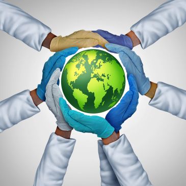Diverse hands in gloves surrounding a green Earth globe, symbolizing global unity and environmental care.