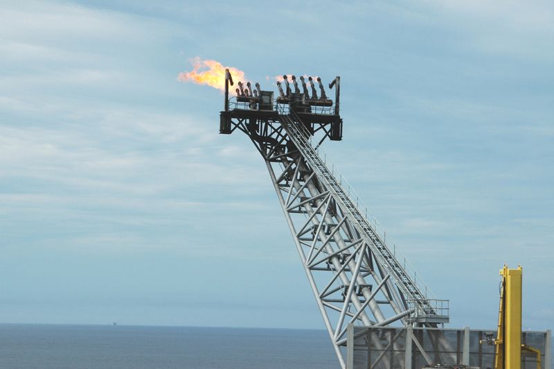 Flaring excessive gas on an offshore drilling platform.
