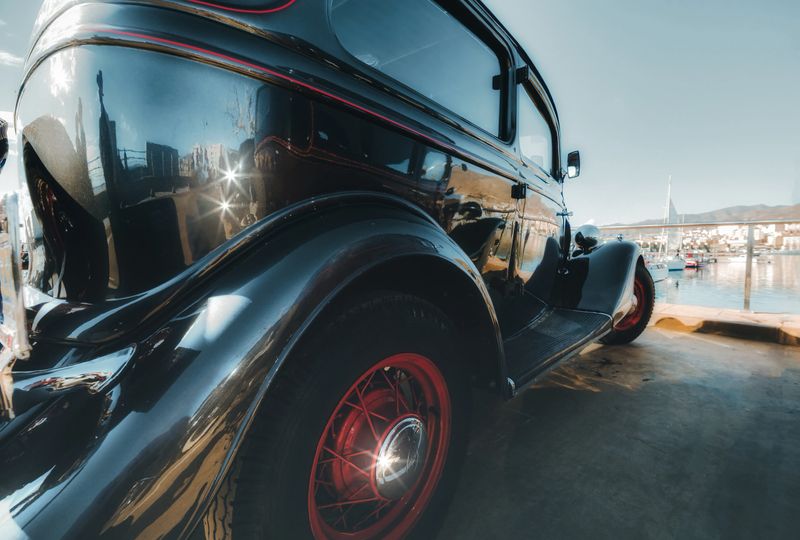 American classic car 20's parked at the marina. Typical gangster luxury automobile of the 20's.