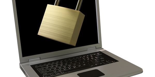 Laptop screen with a large padlock symbolizing cybersecurity.