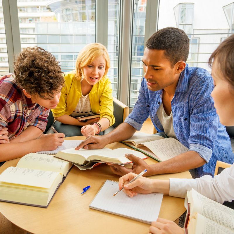 Young Students Working in library