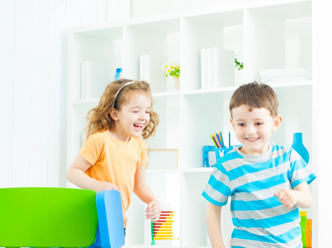 Happy children with colorful crafts