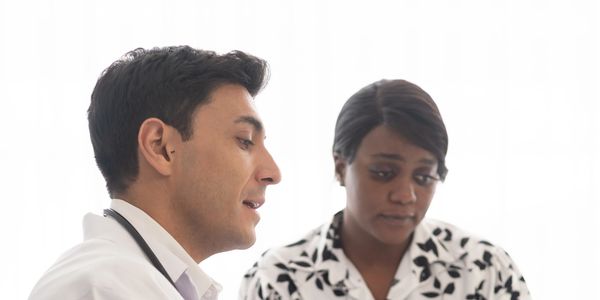 Doctor consulting a patient.