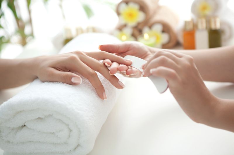 Close up of beautiful female hands having manicure treatment.See more MANICURE and SPA images. Click on image below for lightbox.