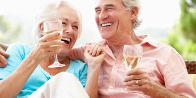 a man and a women tasting white wine