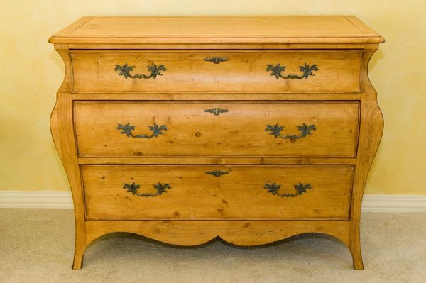 Antique European pine furniture in a cozy room.