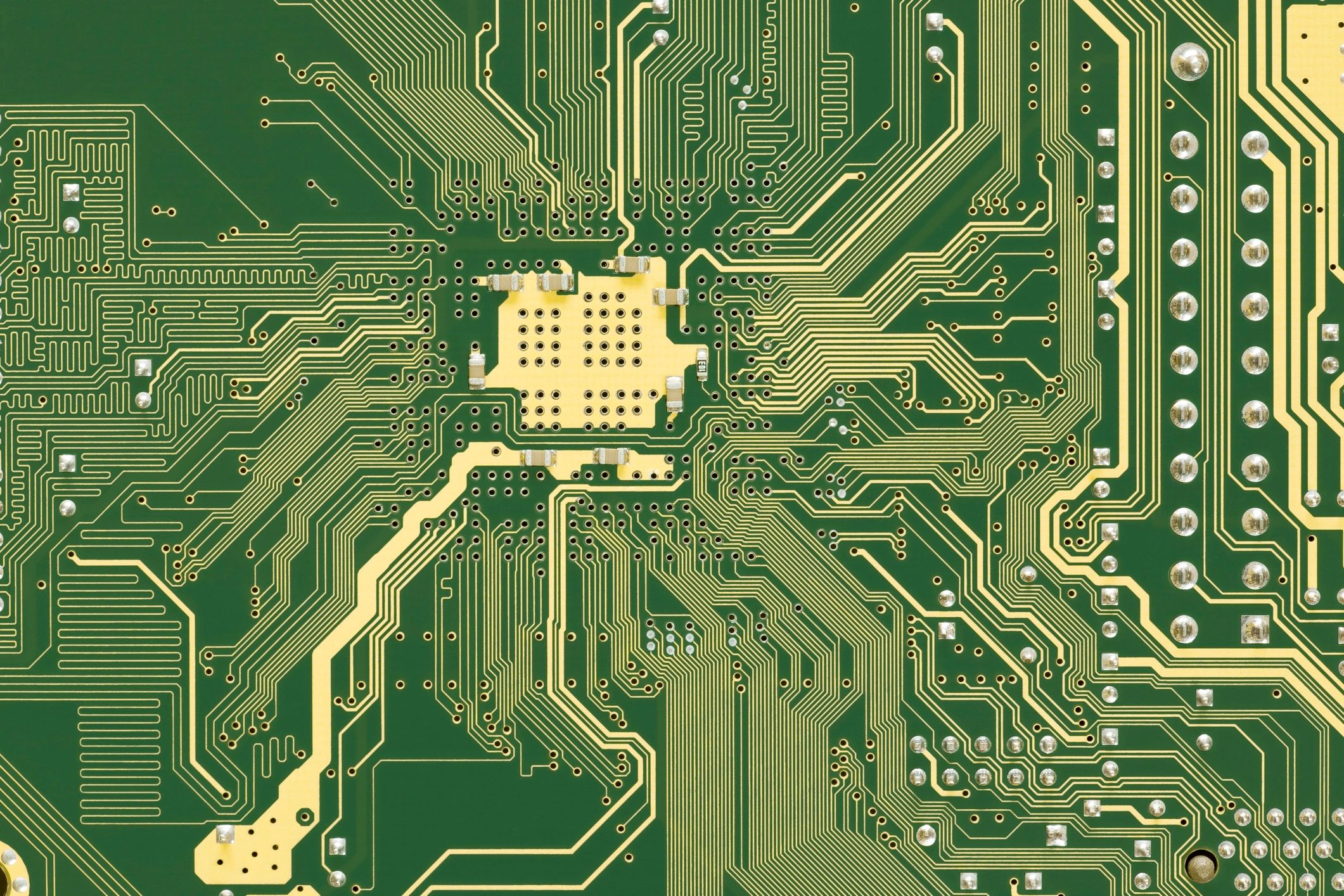 Close-up view of a printed circuit board with intricate pathways.