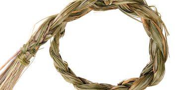 A braided rope formed into a loop against a white background.