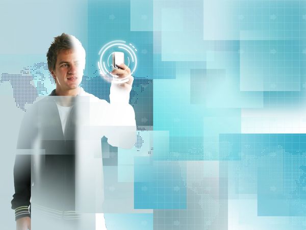 Young man interacting with a futuristic digital interface.