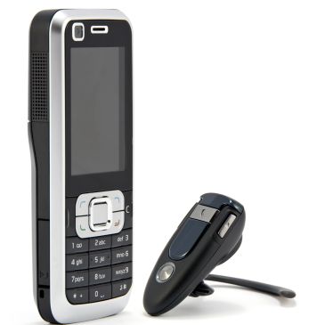 Old mobile phone and Bluetooth headset.