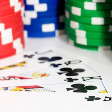 Poker cards and chips arranged for a game.