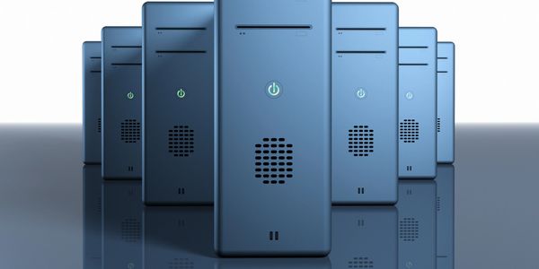 Row of sleek blue computer towers with power icons illuminated.