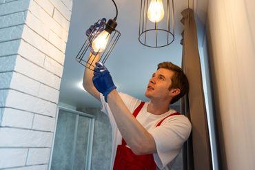 Southern Home Handyman hanging modern decorative lights for homeowner in Richmond, Virginia.