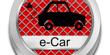 Icon of an electric car with a charging plug on a red grid background.