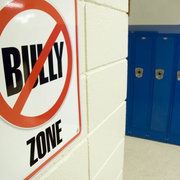 No bullying zone sign near school lockers.