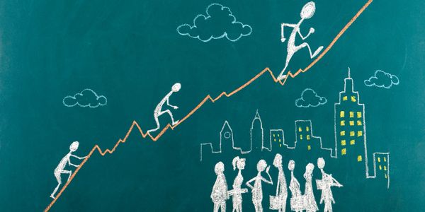 Chalk figures climbing a graph line representing growth and progress.