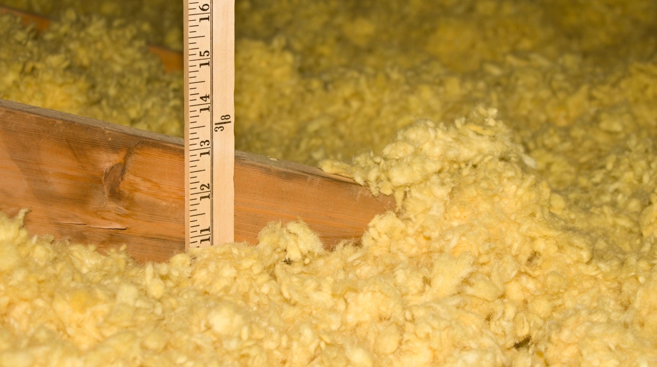 Efficient attic insulation installation.