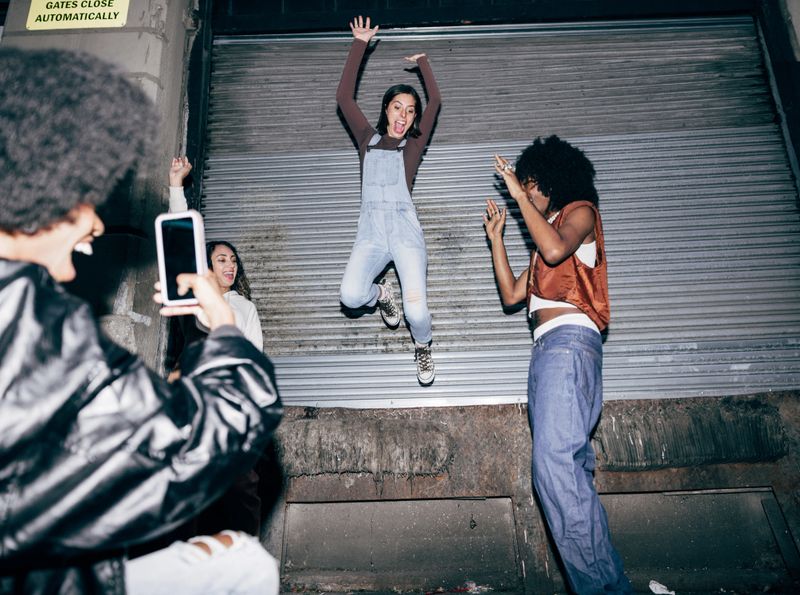 Group of multi ethnic friend enjoying New York nightlife and gathering for a reunion.